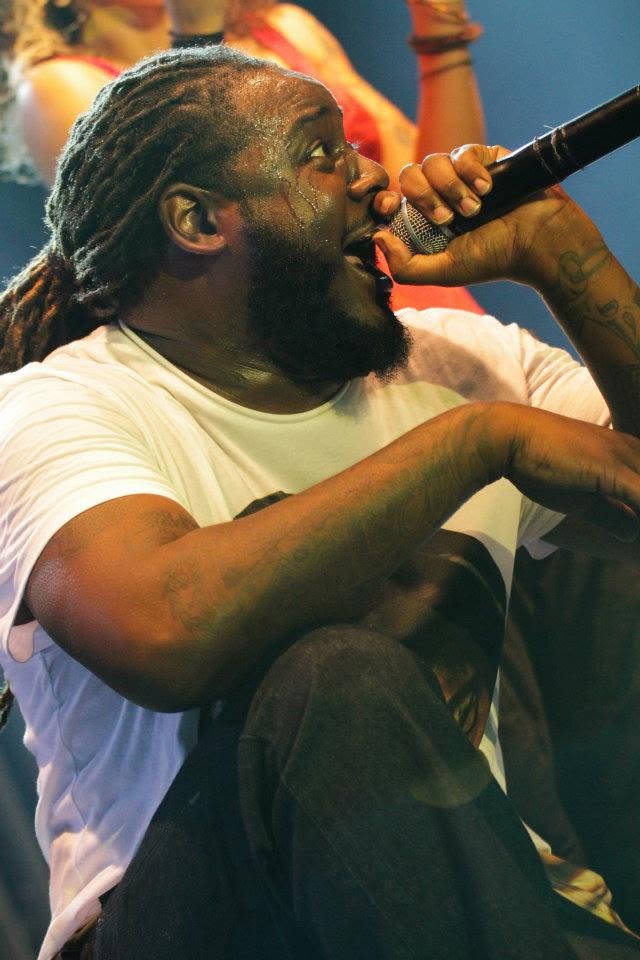 Close-up of T-Pain singing into the microphone
