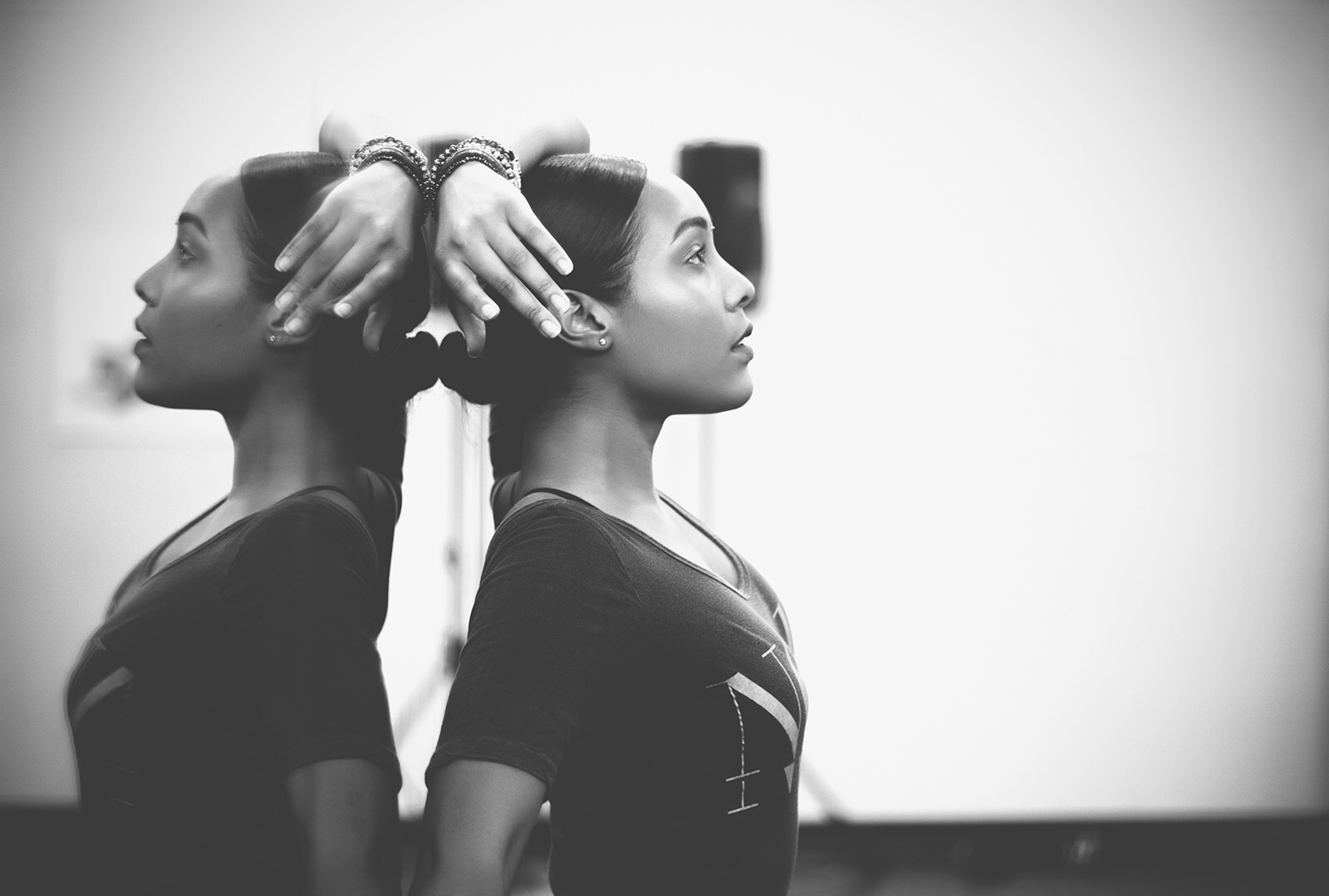Profile portrait reflected in a mirror